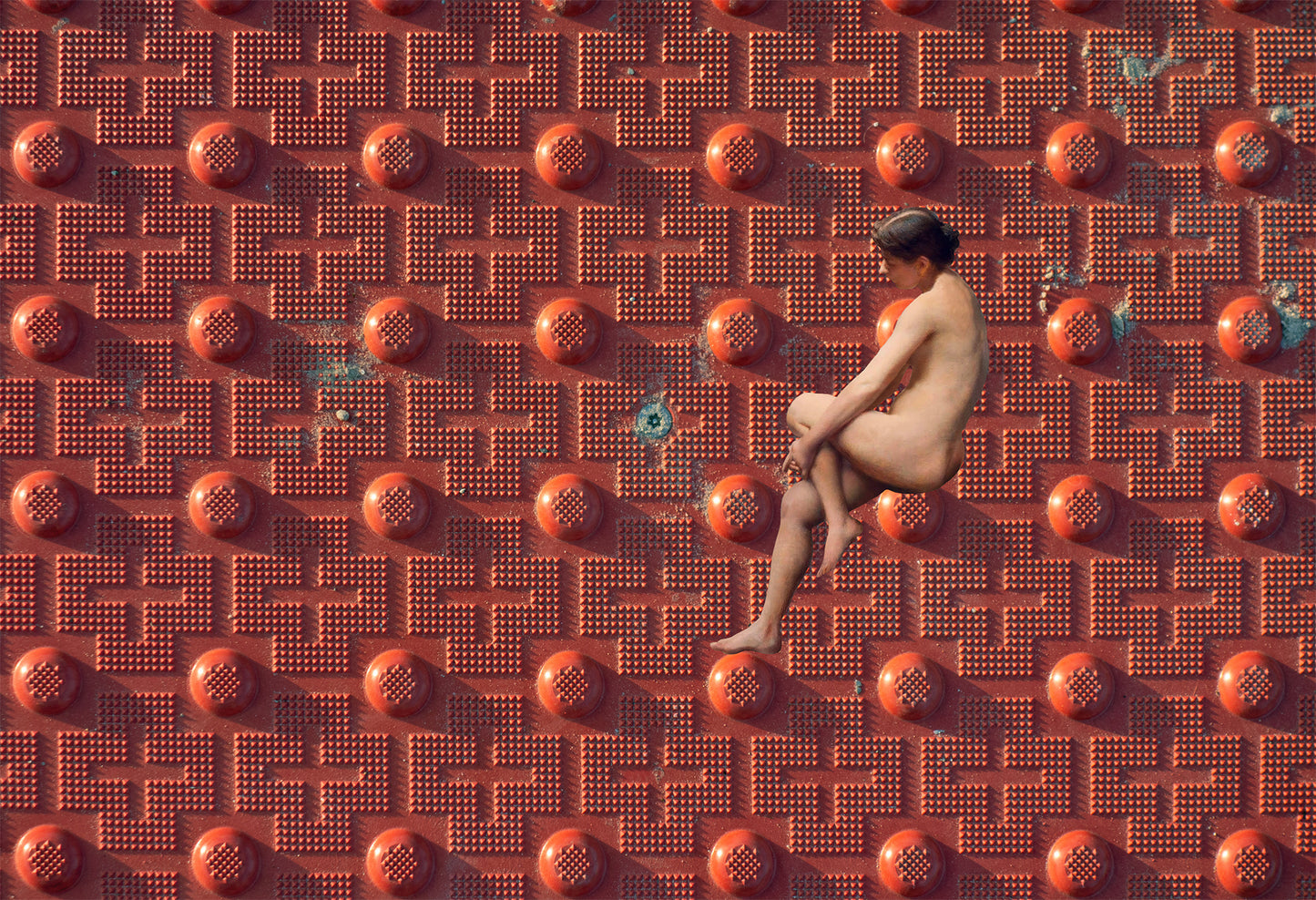 GIRL ON RED MAT